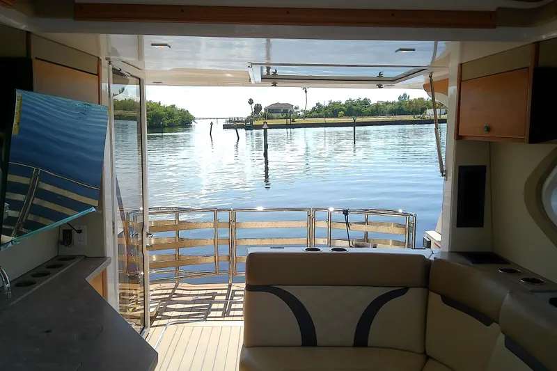 Slide: The Image of Interior view of 2019 Floe Craft 3950C Aquafina boat with scenic water backdrop. - 30
