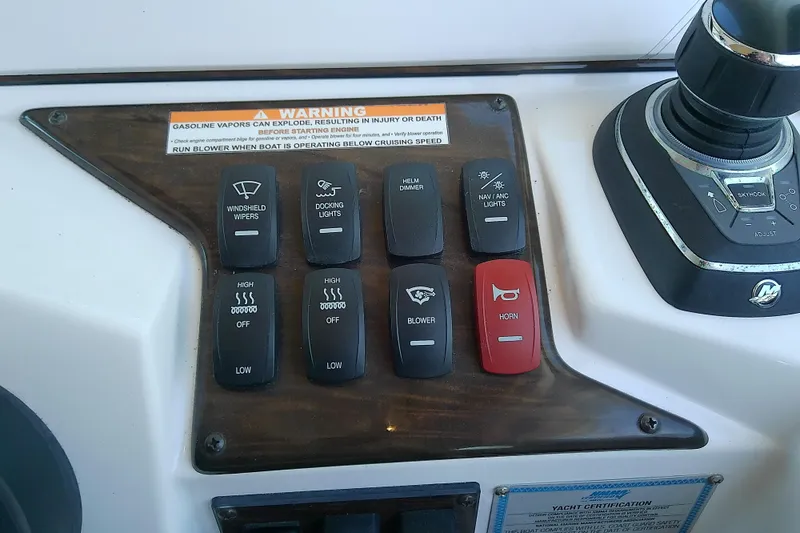 Slide: The Image of Control panel of 2019 Floe Craft 3950C Aquafina with various switches and warning label. - 35