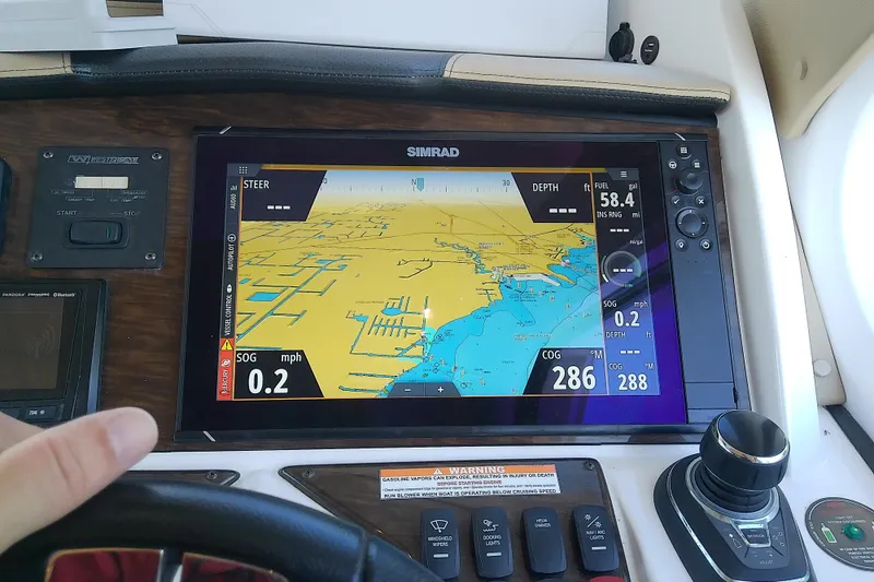 Slide: The Image of Simrad navigation display on 2019 Floe Craft 3950C Aquafina boat dashboard. - 38