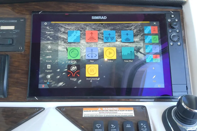 Slide: The Image of Simrad navigation display on 2019 Floe Craft 3950C Aquafina boat dashboard. - 39