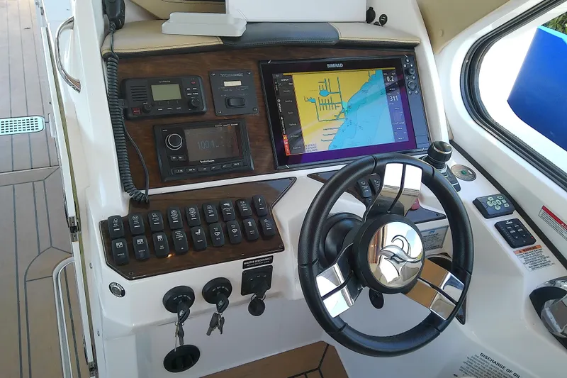 Slide: The Image of 2019 Floe Craft 3950C Aquafina boat dashboard with navigation system and controls. - 43