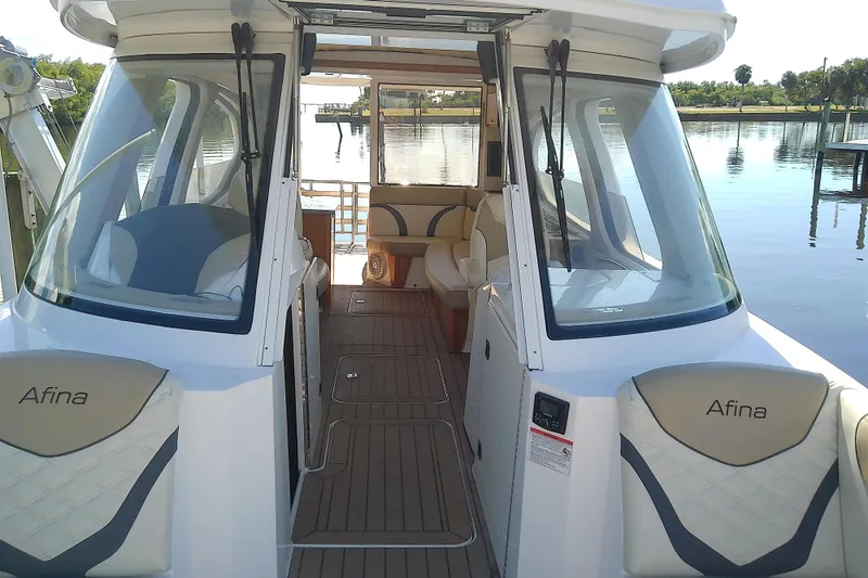 Slide: The Image of 2019 Floe Craft 3950C Aquafina boat interior with seating and lake view. - 55