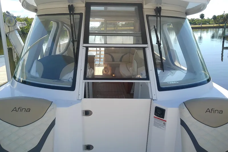 Slide: The Image of 2019 Floe Craft 3950C Aquafina boat interior view with sleek design and comfortable seating. - 56
