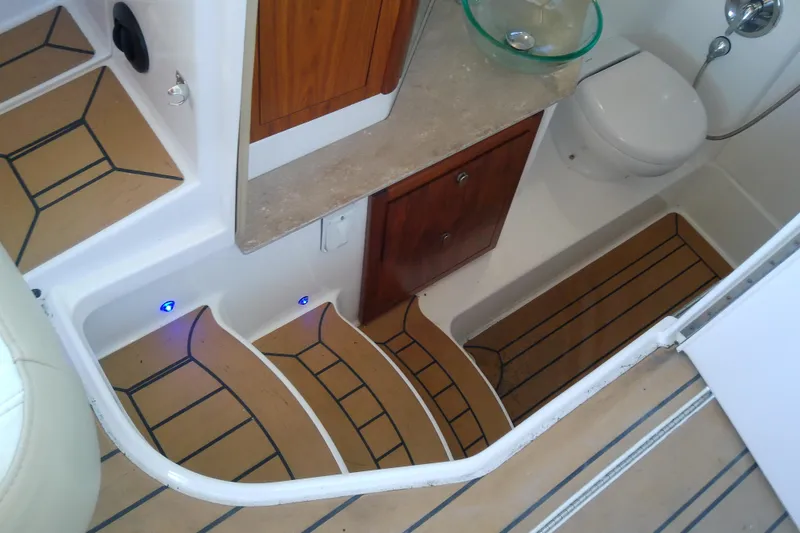 Slide: The Image of Interior of 2019 Floe Craft 3950C Aquafina boat with steps, cabinet, and toilet. - 63