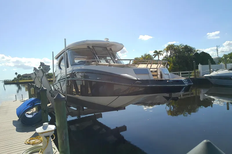 Slide: The Image of 2019 Floe Craft 3950C Aquafina boat docked on a sunny day. - 7