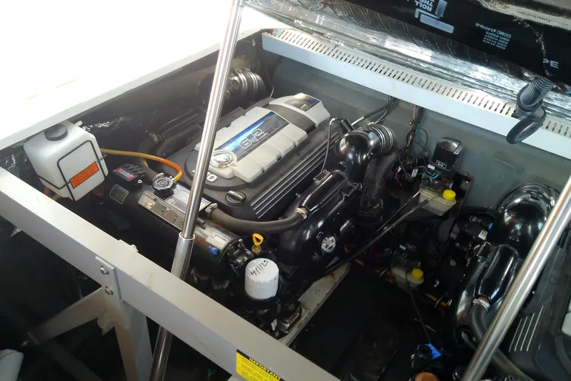 Slide: The Image of 2019 Floe Craft 3950C Aquafina engine compartment with visible components and wiring. - 74