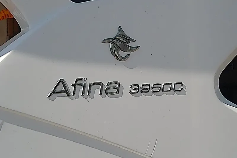 Slide: The Image of Floe Craft 3950C Aquafina 2019 model emblem on white surface. - 9