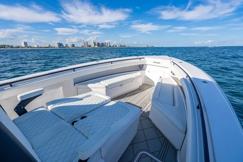 Slide: The Image of Luxurious 2026 Reef Runner 340 boat interior with ocean view and city skyline. - 22