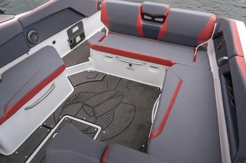 Slide: The Image of 2026 Scarab 285 LX Wake boat interior with gray and red seating, modern design. - 19