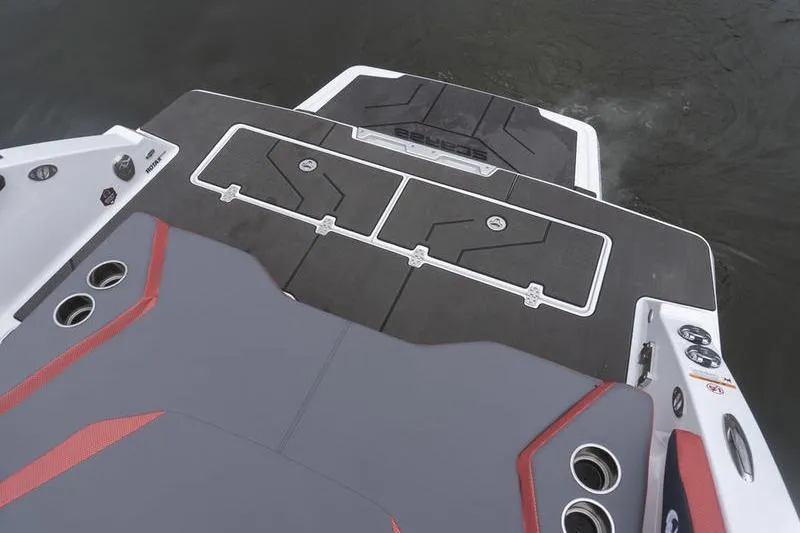 Slide: The Image of 2026 Scarab 285 LX Wake boat deck with sleek design and storage compartments. - 24