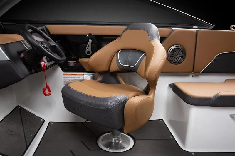 Slide: The Image of 2026 Scarab 285 LX Wake boat interior with tan and black seating. - 7