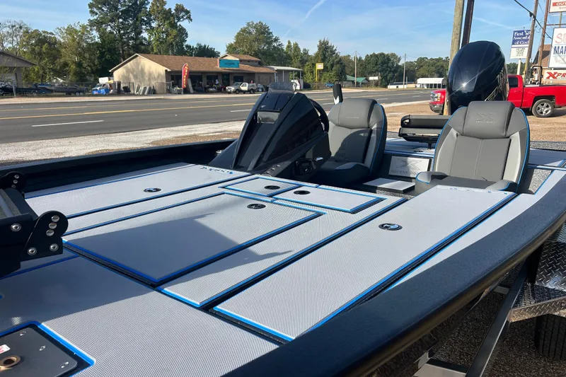 Slide: The Image of 2026 Xpress H20C Crappie boat with sleek design and modern seating on display. - 6