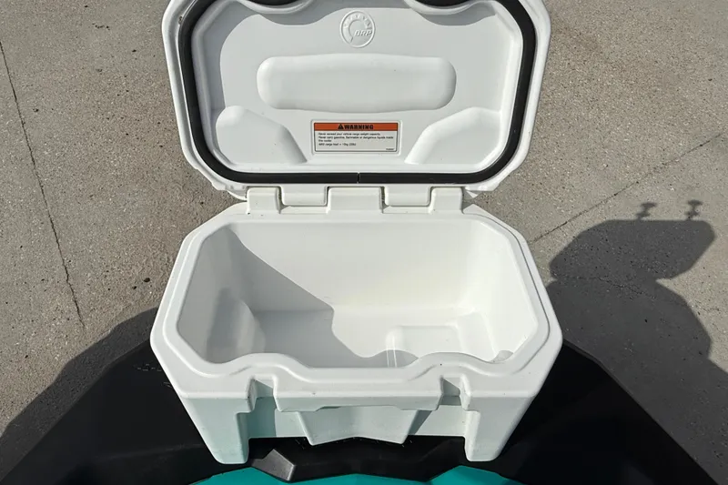 Slide: The Image of Open storage compartment on 2022 Sea-Doo Spark 3up, showing interior space. - 8