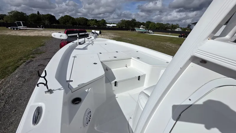 Slide: The Image of 2015 Sea Hunt BX 24 BR boat parked on a trailer. - 11
