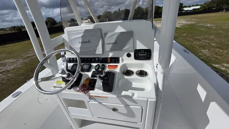 Slide: The Image of 2015 Sea Hunt BX 24 BR boat console with Garmin devices. - 12
