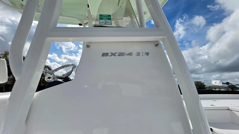 Slide: The Image of Sea Hunt BX 24 BR boat from 2015 under blue sky. - 2