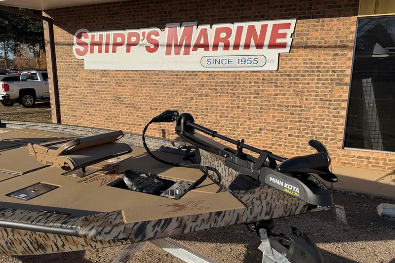 Slide: The Image of 2026 Xpress H20C Crappie boat at Shipp's Marine dealership, featuring Minn Kota trolling motor. - 5