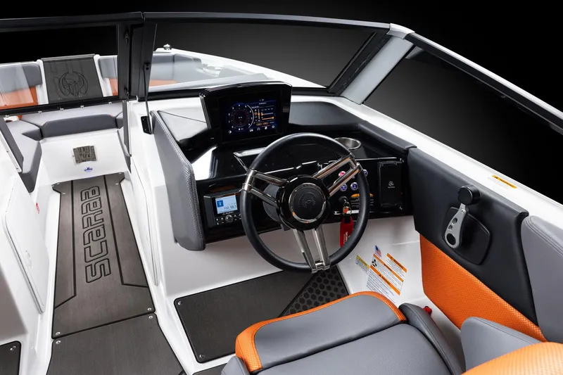 Slide: The Image of Manufacturer Provided Image: 2026 Scarab 210 LX Wake boat interior with modern dashboard and steering wheel. - 3