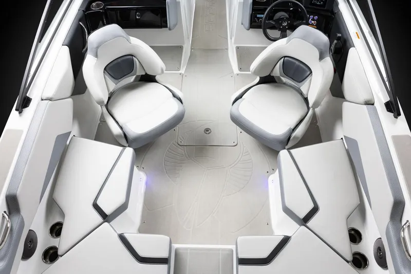 Slide: The Image of Manufacturer Provided Image: 2026 Scarab 210 SE boat interior with modern seating and sleek design. - 6