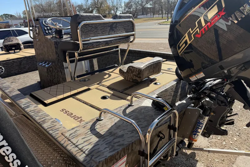Slide: The Image of 2026 Xpress H210B Bay boat with Yamaha VMAX engine, featuring camo design and spacious deck. - 6