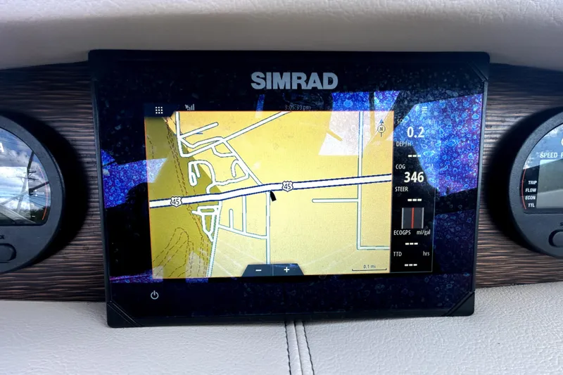 Slide: The Image of Simrad navigation display on 2018 Four Winns HD240 boat dashboard. - 67