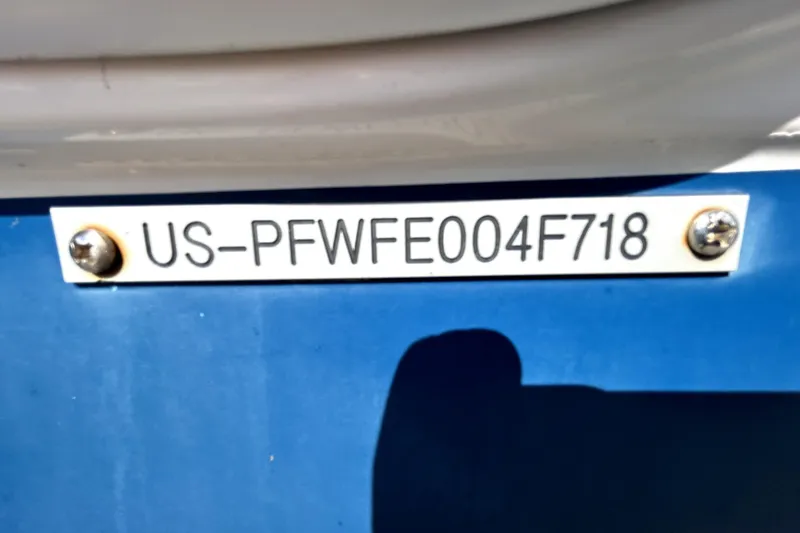 Slide: The Image of 2018 Four Winns HD240 boat identification plate with serial number US-PFWFE004F718. - 91