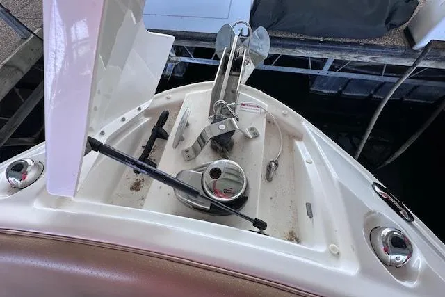 Slide: The Image of 2019 Sea Ray SLX 250 boat anchor system and deck details. - 13