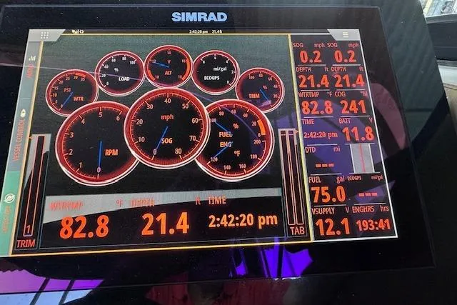 Slide: The Image of Simrad display showing Sea Ray SLX 250 boat metrics, including speed, RPM, and fuel levels. - 21
