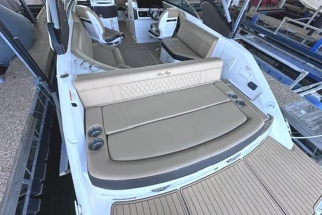 Slide: The Image of 2019 Sea Ray SLX 250 boat interior with spacious seating and elegant design. - 7