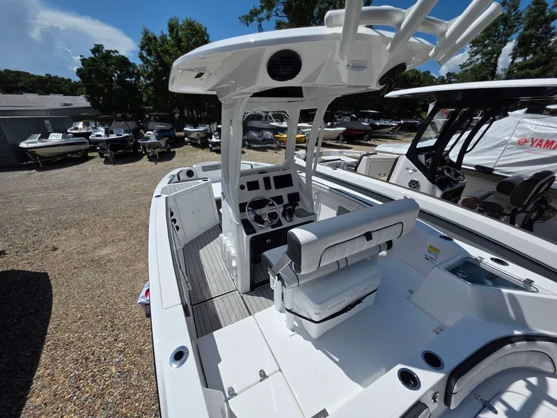 Slide: The Image of The image shows a modern Yamaha boat with a central helm and seating area. - 5