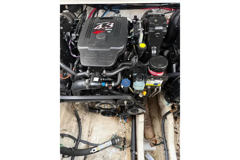Slide: The Image of Engine of a 2007 Sea Ray 340 boat, featuring a MerCruiser 4.3 MPI motor. - 14
