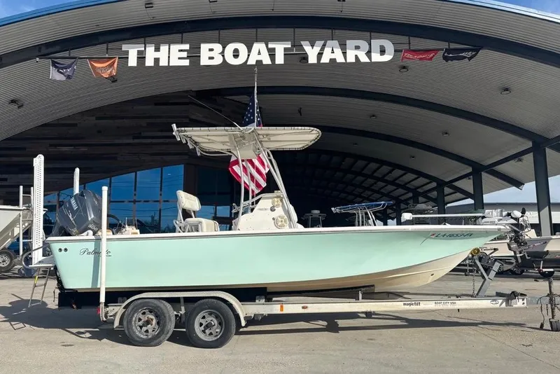 Slide: The Image of 2004 Palmetto 22 boat on trailer at The Boat Yard dealership. - 21