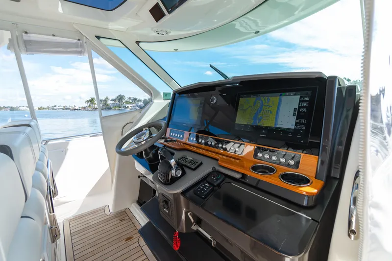 Slide: The Image of 2020 Tiara Sport 38 LS boat helm with advanced navigation system and luxurious interior. - 24