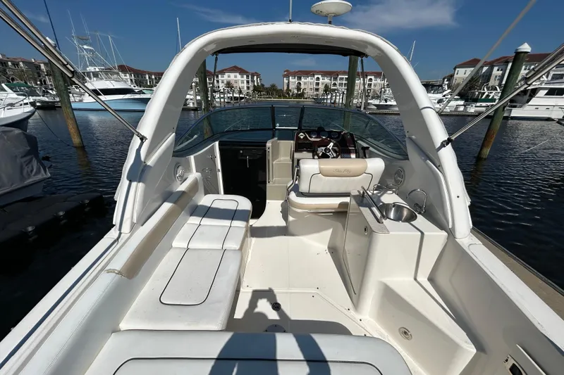 Slide: The Image of Open hatch in 2010 Sea Ray Sundancer 260, revealing interior components and wiring. - 101
