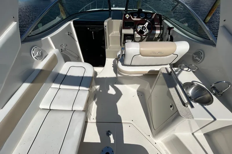 Slide: The Image of Bilge compartment of 2010 Sea Ray Sundancer 260 with hoses and pump system. - 102
