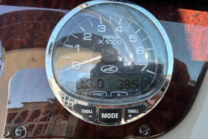 Slide: The Image of 2010 Sea Ray Sundancer 260 bathroom with stainless steel sink and compact toilet. - 106