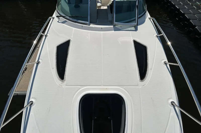 Slide: The Image of Kitchen sink and faucet on a 2010 Sea Ray Sundancer 260 boat. - 119