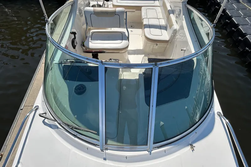 Slide: The Image of Empty refrigerator drawer in a 2010 Sea Ray Sundancer 260 boat interior. - 123