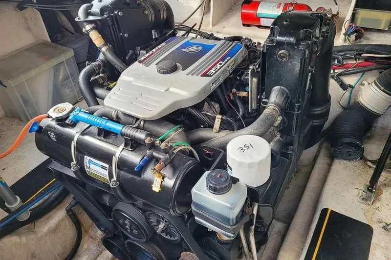 Slide: The Image of Engine of a 2010 Sea Ray Sundancer 260 boat, showcasing detailed components. - 17