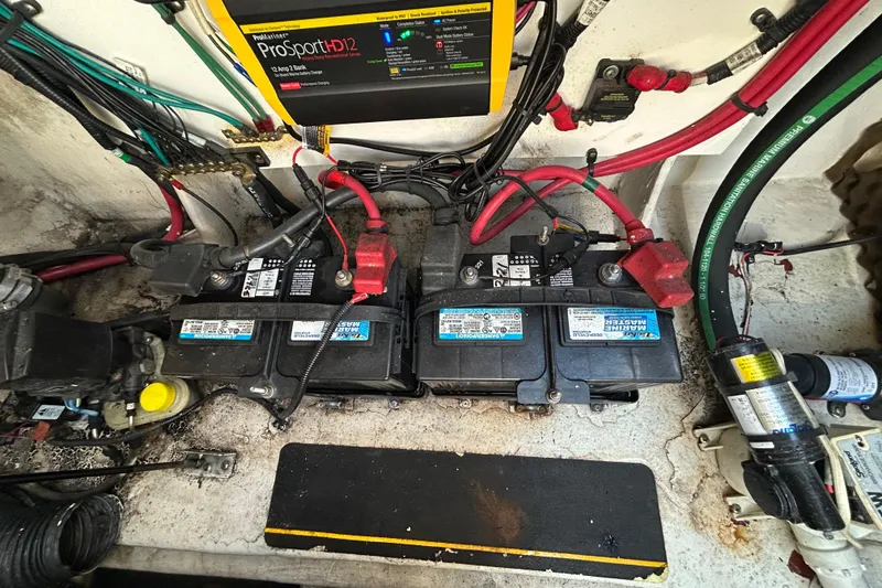 Slide: The Image of Storage compartment on a 2010 Sea Ray Sundancer 260 boat with safety equipment. - 51