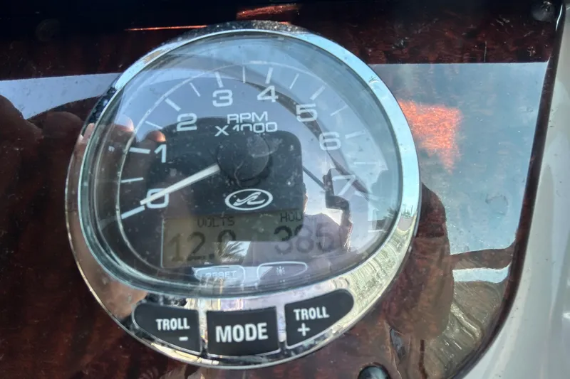 Slide: The Image of Engine of a 2010 Sea Ray Sundancer 260 boat, showcasing detailed components. - 54