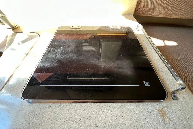 Slide: The Image of Dashboard of 2010 Sea Ray Sundancer 260 with speedometer, tachometer, and compass. - 68