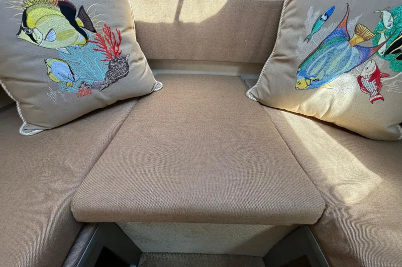 Slide: The Image of Storage compartment with cooler on a 2010 Sea Ray Sundancer 260 boat. - 86