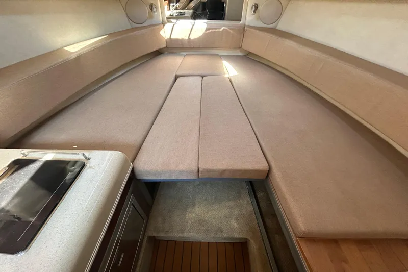 Slide: The Image of Bow of 2010 Sea Ray Sundancer 260 with anchor chain and water reflection. - 88