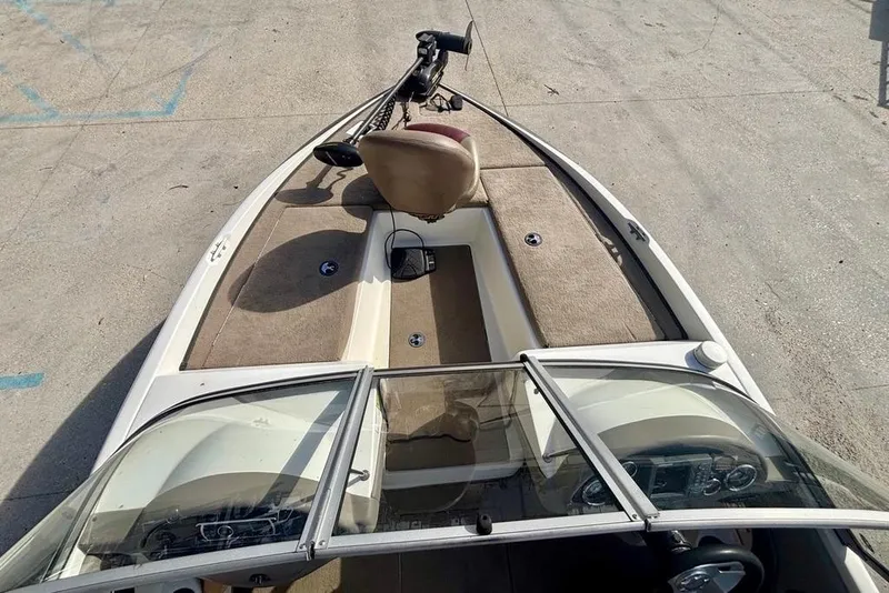 Slide: The Image of 2008 Ranger 180 Reata boat interior with seating and control panel, viewed from above. - 14