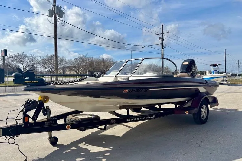 Slide: The Image of 2008 Ranger 180 Reata boat on trailer under blue sky. - 7