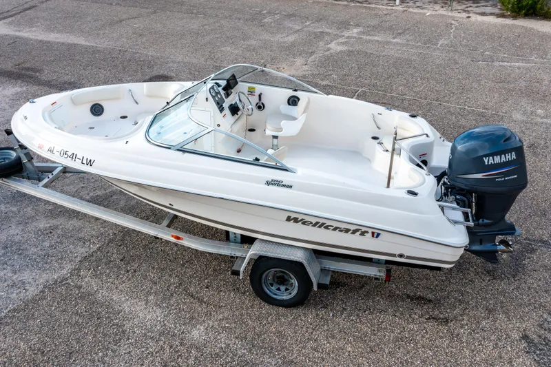 Slide: The Image of 2008 Wellcraft 180 Sportsman boat, aerial view, showcasing seating and layout. - 2