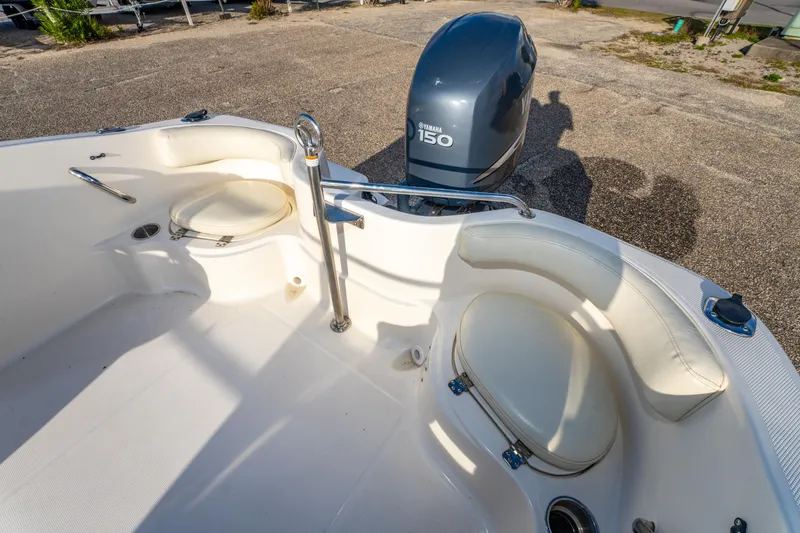 Slide: The Image of 2008 Wellcraft 180 Sportsman boat interior with seating and windshield, viewed from above. - 23