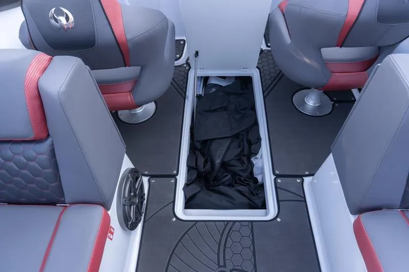 Slide: The Image of 2026 Scarab 255 LX Wake boat interior with storage compartment and stylish seating. - 20