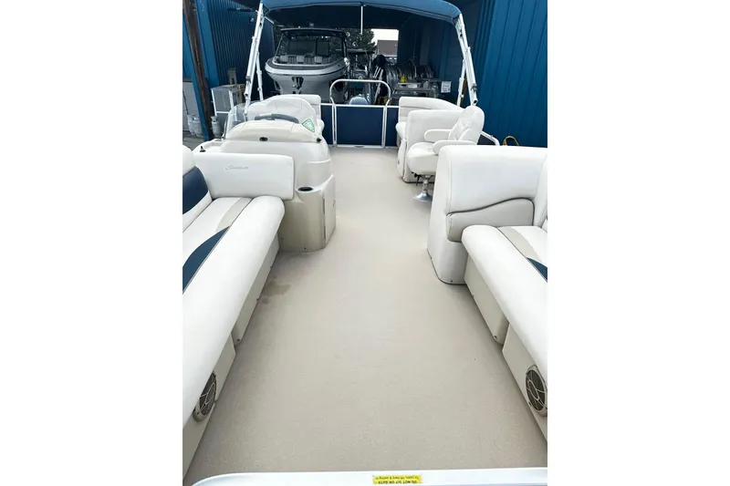 Slide: The Image of 2015 Godfrey 2286 Sweetwater Pontoon with spacious seating and canopy. - 6